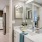 brightly lit bathroom across from the kitchen